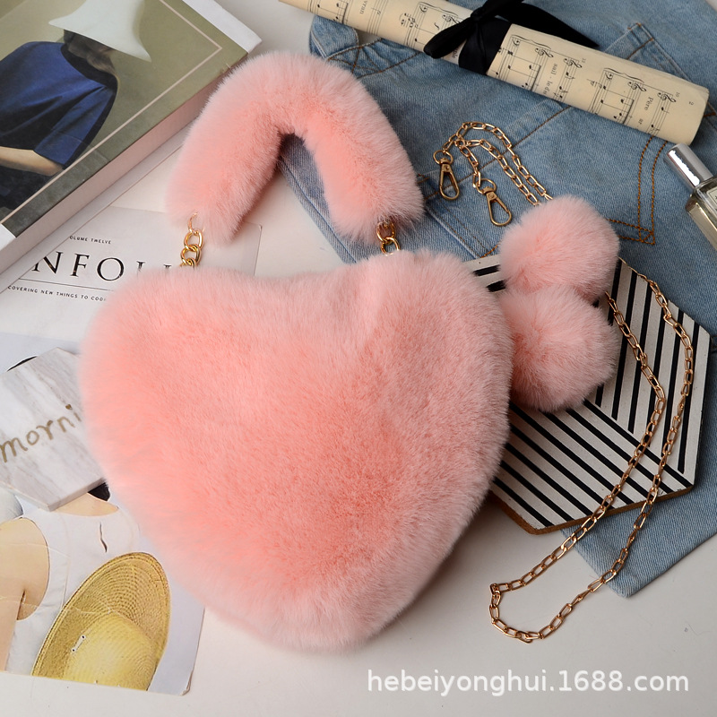 Fabricante en stock bolsa de corazón de melocotón portátil moda felpa en forma de corazón bolsa de peluche bolso de las mujeres