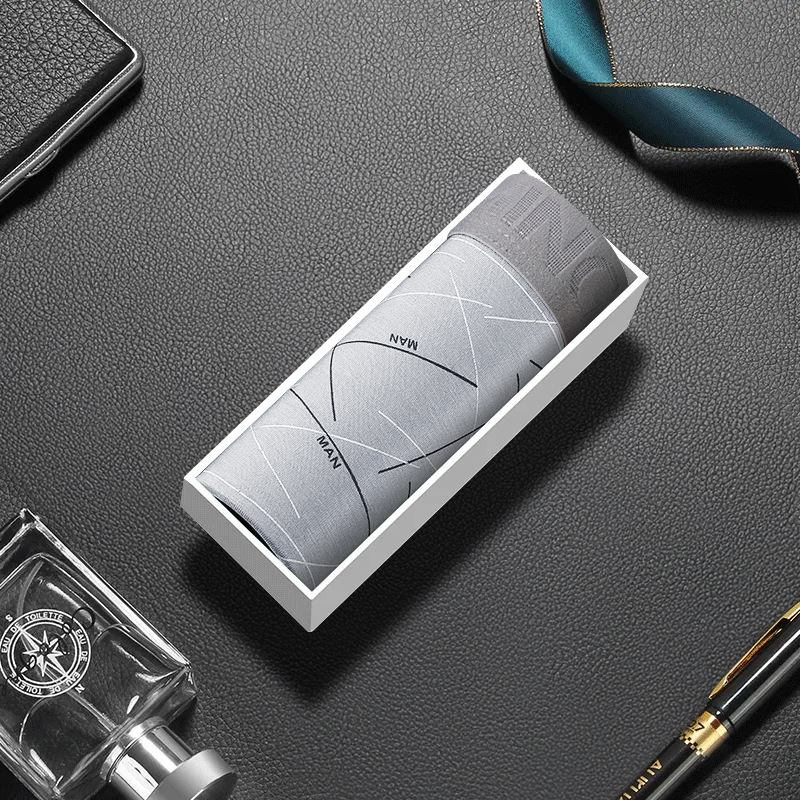 Comercio exterior de algodón de leche de color sólido de alta calidad sin marcas de ropa interior de hombre respirable alta elástica pantalones planos largos sueltos pantalones de calzado