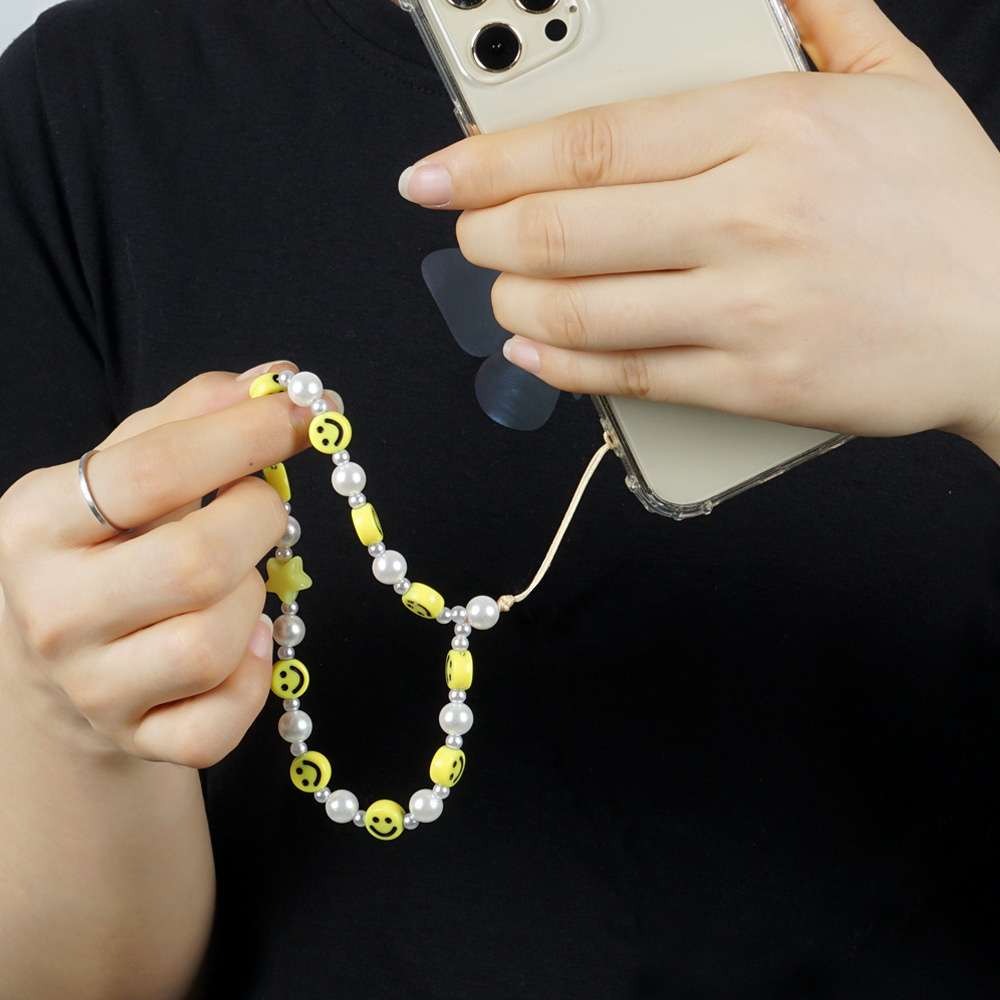 Korean fashion pearl pendant acrylic smiley mobile phone chainpicture3