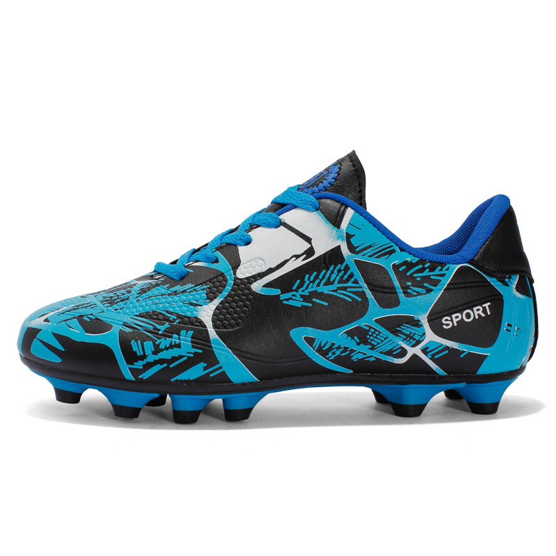 Zapatos de fútbol de clavos largos transfronterizos para niños al aire libre primavera y verano para estudiantes de primaria y secundaria zapatos de entrenamiento deportivo de clavos al por mayor