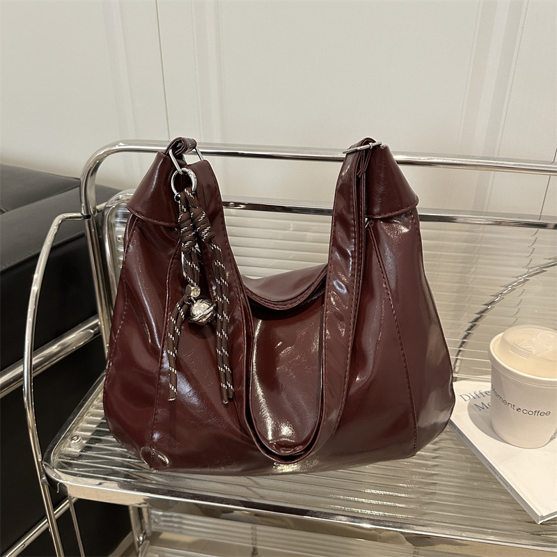 Bolsa de viaje casual de gran capacidad para mujeres 2025 primavera y verano nueva moda versátil hombro de hombro con una sensación relajada bolso
