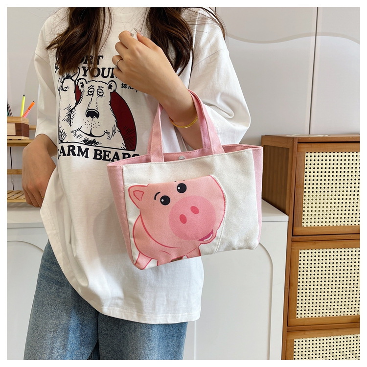Cute cartoon printed small bag, 2024 summer new style hand-held piggy girl handbag, student storage canvas bag Specification drawing
