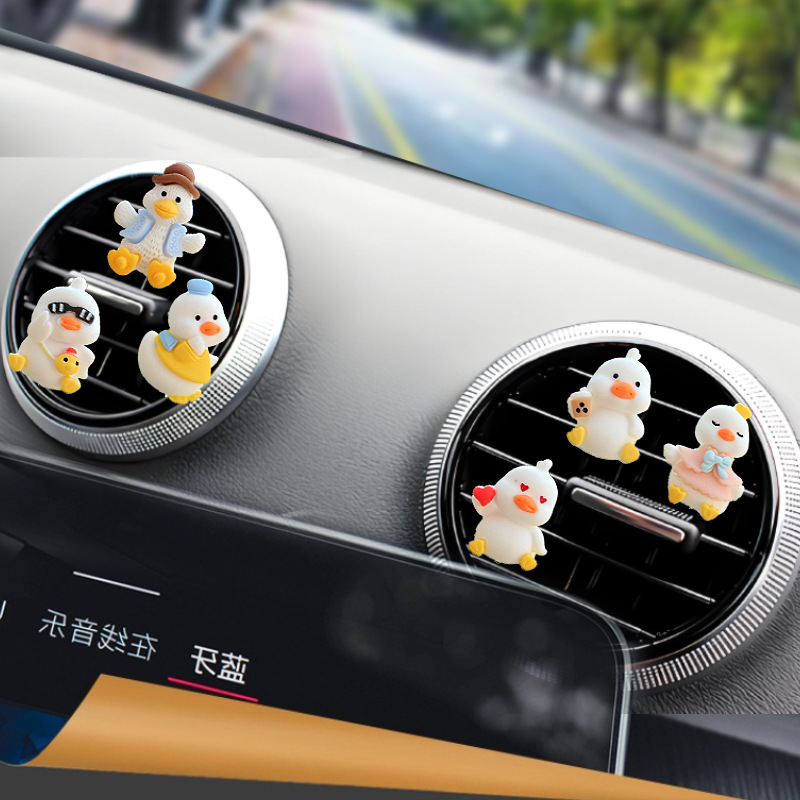 El nuevo adorno de coche de pato súper lindo adorno de la pantalla de navegación de la consola central del coche de dibujos animados