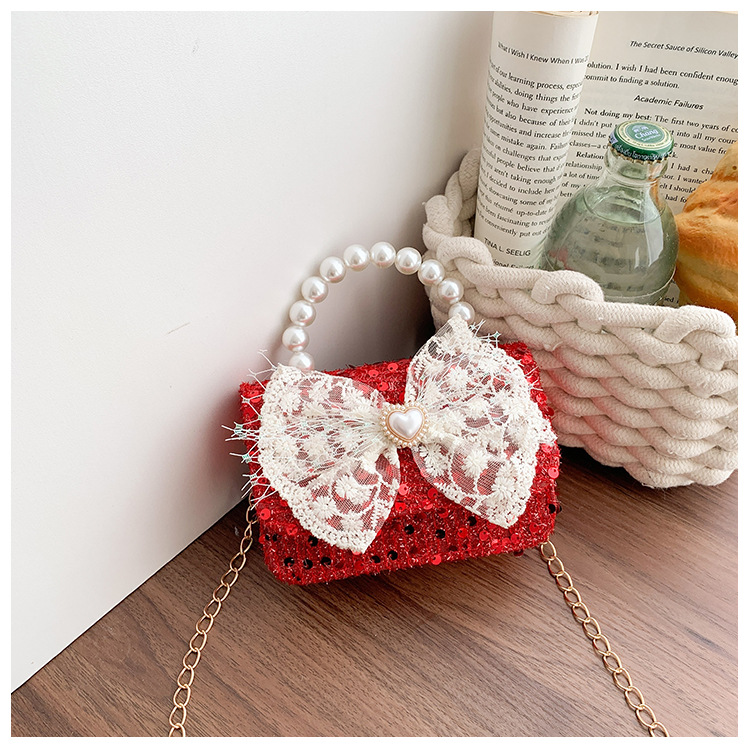 Caricatura adorable animal pequeño, bolso de hombro para niños y niñas, bolso de perla de arco dulce, nuevo mini bolso para niños