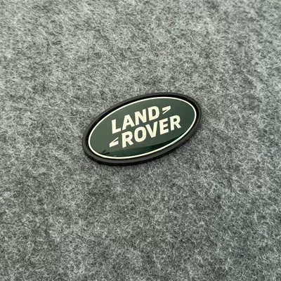 "Queen's Signature" emblem, the Genesis emblem, the tail | Car logo - standard-
