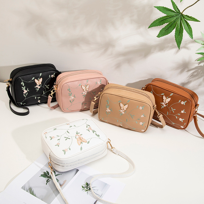 Bolsas de cámara de hombro de moda de mariposa decoración 2024 bolsas de mujer verano y otoño nuevo estilo de personalidad de bolsas de cambio inclinadas
