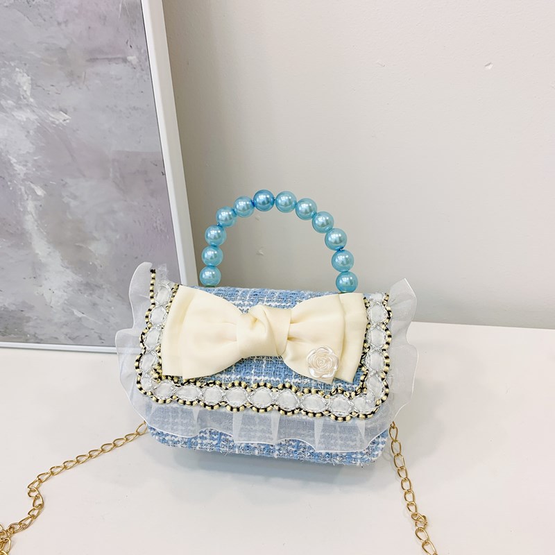 Bolsa de hombro coreana para niñas, arco de perlas, lindas flores, bolso de mochila para bebés, nuevo tipo de bolso para niños fragante.