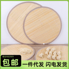 ギョーザのカーテンに餃子のトレーを入れて、家庭用のカーテンを厚くして、水餃子の蓋を敷いて、丸い干し蒸しマントーを敷きます。