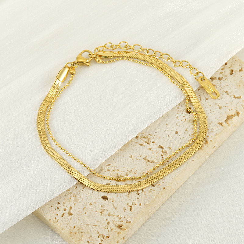 Moda europea y americana estilo francés nuevo tobillera de acero de titanio para mujer chapado en oro de 18 quilates cadena de tobillera de acero de titanio fabricante spot al por mayor