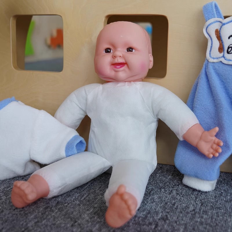 Muñeca de simulación Educación temprana Jardín de infantes Paño para niños Cuerpo de bebé Juego de casa Niños y niñas Juguetes educativos