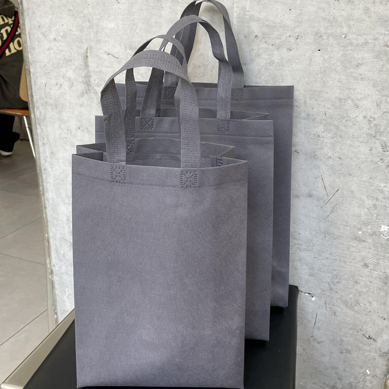 Bolsa de tela no tejida vertical gris, bolsas de regalo para tiendas de ropa LOGO