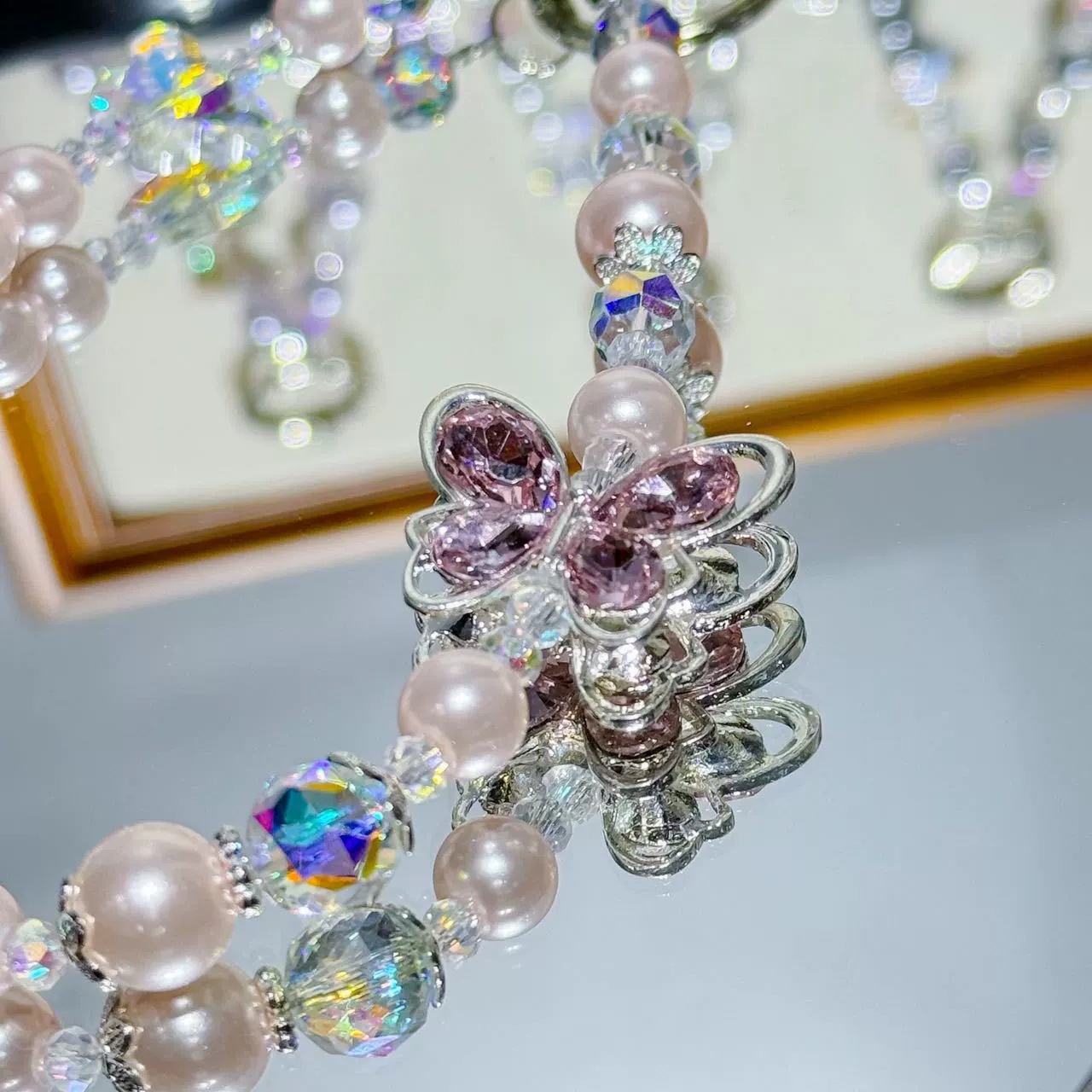 Nueva aleación de mariposa de diamantes de alta calidad, cuentas de colores de cinco estrellas, cadena de teléfono móvil, bolsa de coche, colgante corto, cordón al por mayor