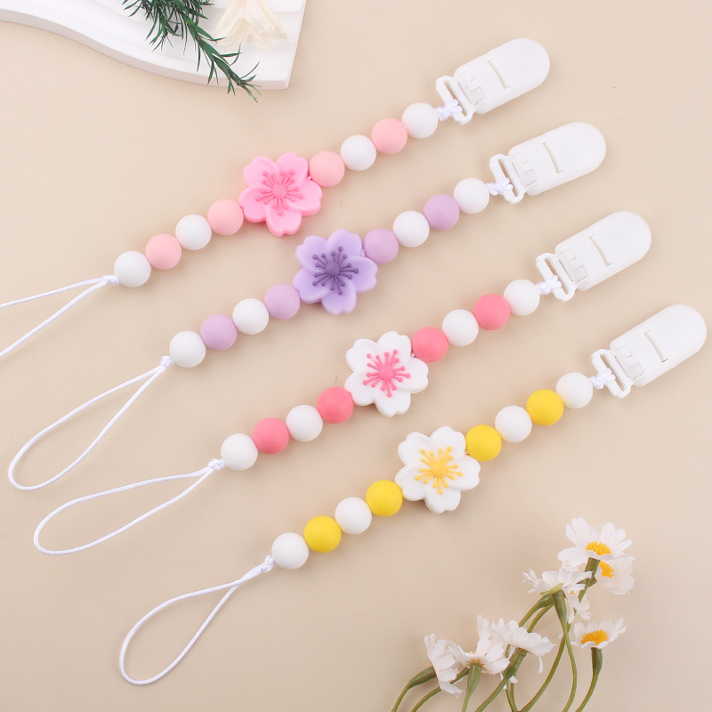 Productos para bebés Clip de chupete de plástico de bricolaje para bebés Flor de begonia creativa gel dental de silicona Chupete anti-caída de la cadena