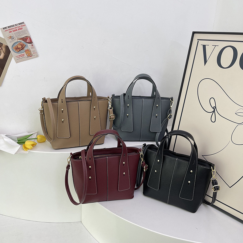 Invierno nuevo estilo 2024 moda bandolera bandolera marea ciudad simple ocio cubo bolso patrón lichi