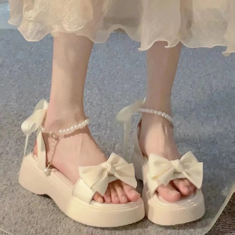 Sandalias de vacaciones coreanas de princesa para mujeres verano 2026 nuevo arco de fondo grueso estilo de hadas con falda zapatos romanos image 7