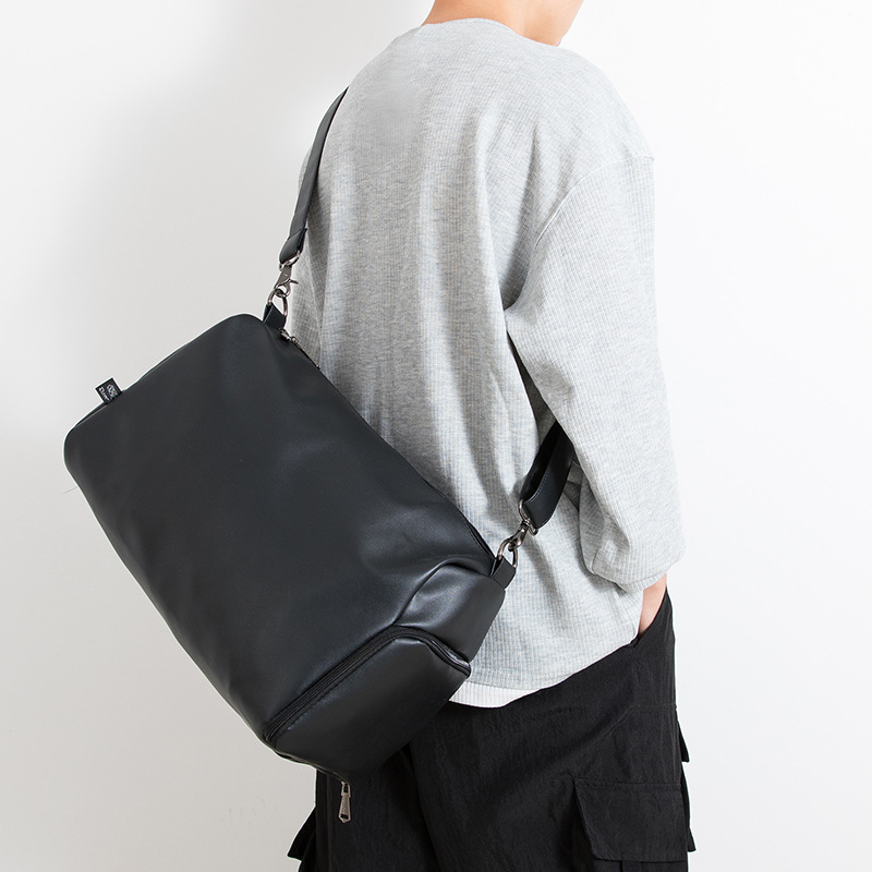 Bolsa de viaje de moda de gran capacidad, bolsas de viaje casuales de cuero suave para hombres y mujeres, bolsas deportivas de moda simples. image 1