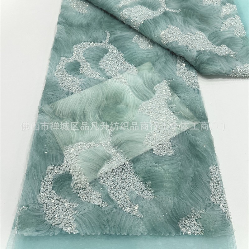 Tela de bordado de tubo de cuentas de onda tridimensional de alta costura vestido de novia de mujer vestido de moda tela en stock