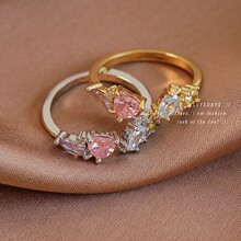 �羳ʱ�аٴ���Ʒ����΢���ʯ��ɫ���Ŀ��ڽ�ָС�ڸ���ָ������