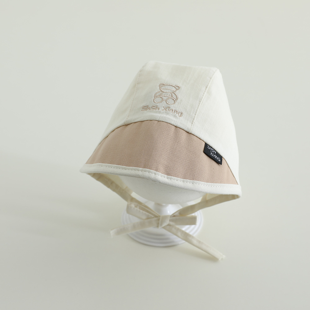 Sombrero coreano para bebés primavera y otoño delgado lazos letras baojou sombrero de corte sombrero de sombrero de abrigo recién nacido puerta de chimenea sombrero de marea