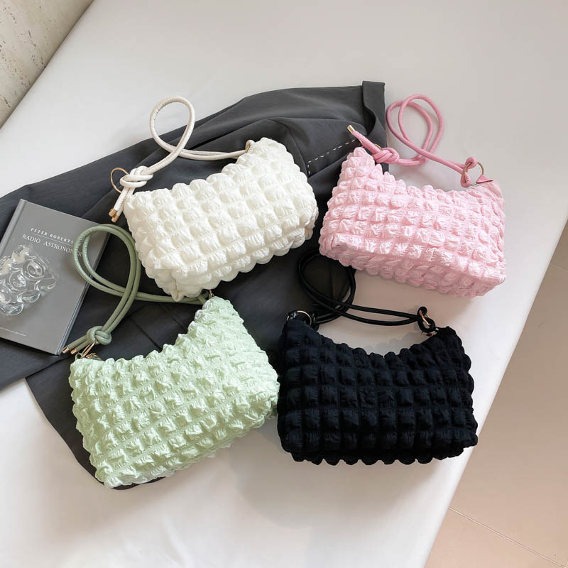 Bolso de moda simple y suave para mujeres, bolso de brazalete para mujeres, verano 2025, nuevo bolso de hombro universal.