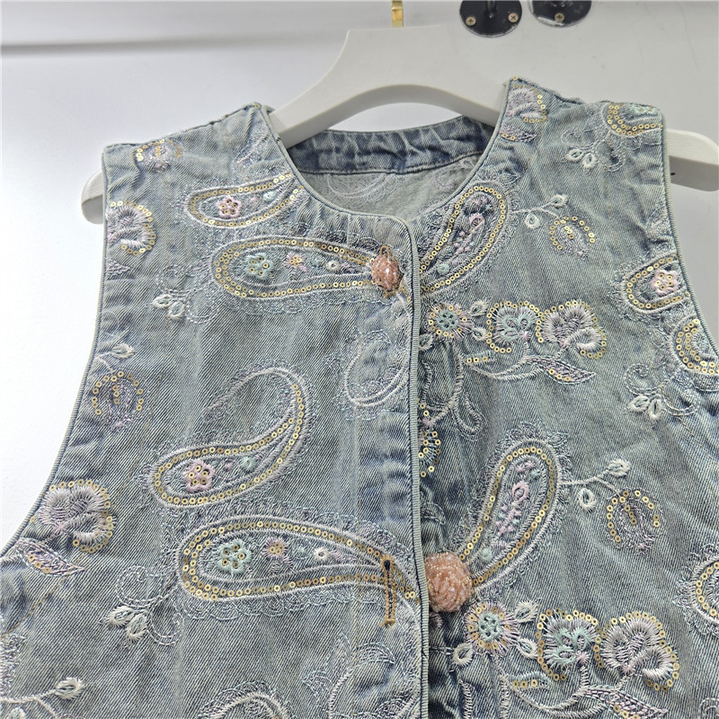 2026 primavera azul industria pesada bordada flor de anajuez chaleco denim de moda alta sensación de cuello redondo chaleco de hombro