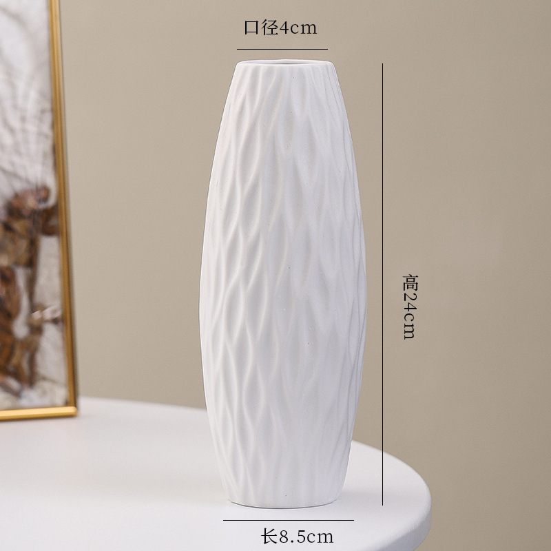 シンプルな現代の満天星陶磁器の花瓶の置物の客間の白い磁器の小さい清新な乾いた花の生け花の創意の陶磁器の花器|undefined