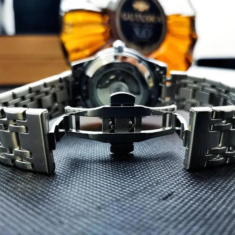 AOKULASIC/ogulas hombres rhinestone reloj mecánico automático hueco doble calendario multifuncional reloj de correa de acero