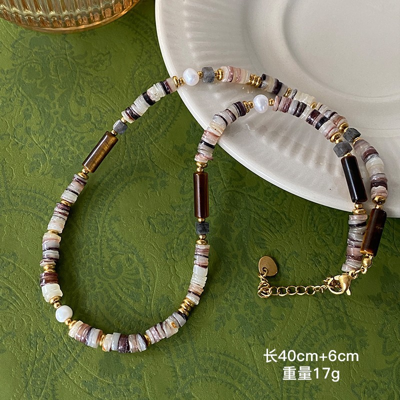 Collar con cuentas de ojo de tigre Maillard Cadena de suéter de otoño e invierno de alta calidad Acero de titanio Cadena de clavícula de piedra natural retro de lujo ligero