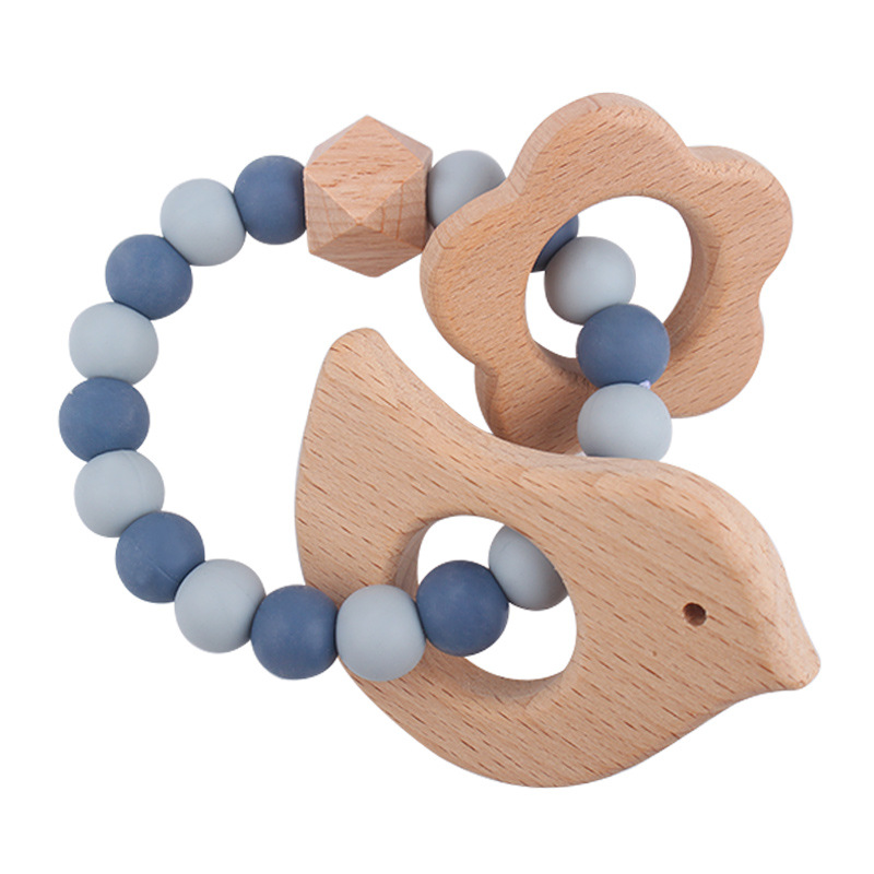 Nuevo bebé dibujos animados pájaros pulsera de madera de haya juguetes creativos pulsera de dientes de silicona pulsera de dientes