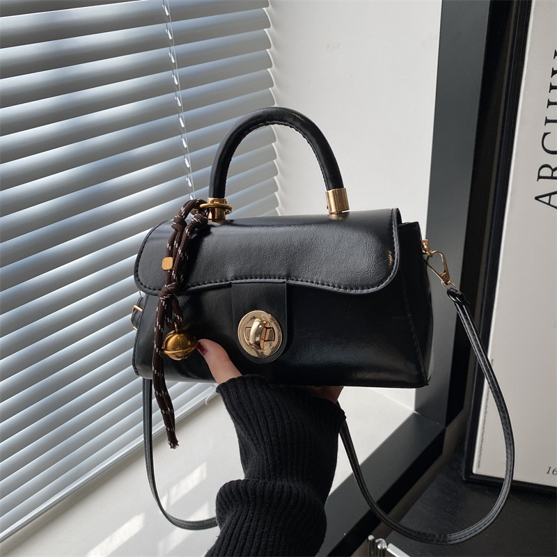 Retro simple bolso de mujer 2024 otoño invierno nuevo bolso de mano cuadrado de estilo exterior versátil alta textura mochila