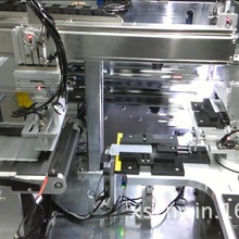 动力电池手机电池电芯头部两端封边茶色高温胶纸自动贴裹胶设备