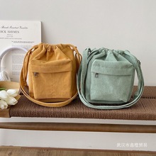 2023新款韩版灯芯绒包包女大容量单肩斜挎包小清新森系纯色水桶包