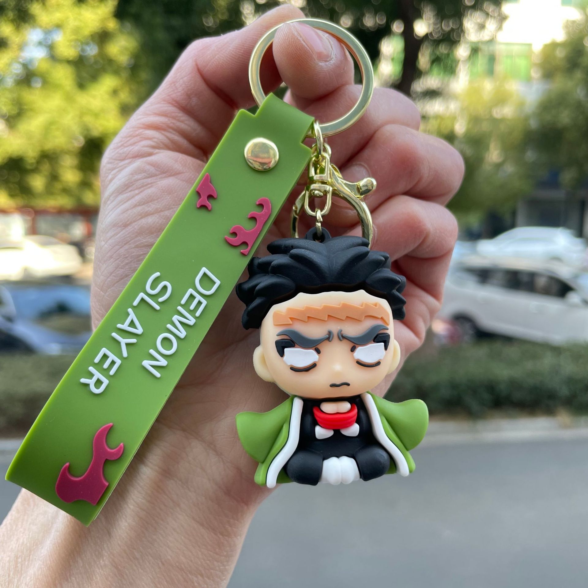 鬼滅の刃の鍵は自動車のキーチェーンの漫画の公仔のかばんのペンダントの子供機の小さい贈り物の卸売りを掛けます。