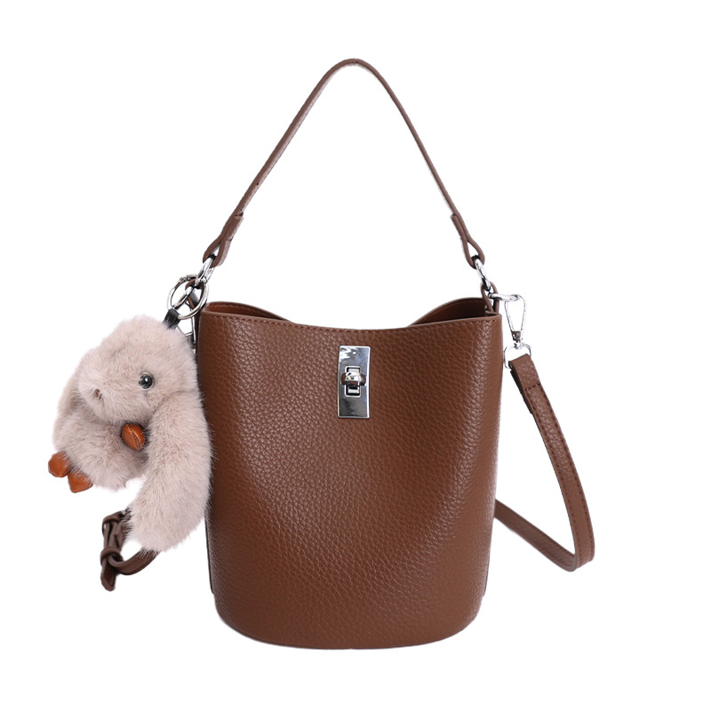 Bolso de nicho coreano portátil cubo de agua bolso para niños ventas calientes nueva textura de alta calidad lujoso ligero ocio versátil bolso de mochila