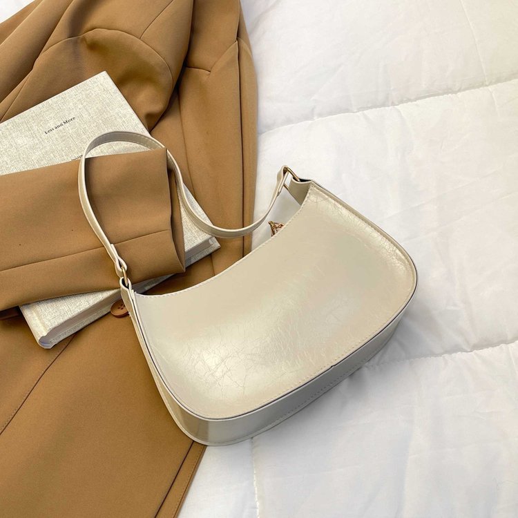 Niche Zhong retro bolso de braza, bolso de alta calidad, nuevo estilo de bolso de viaje, bolso de hombro de moda de gran capacidad.