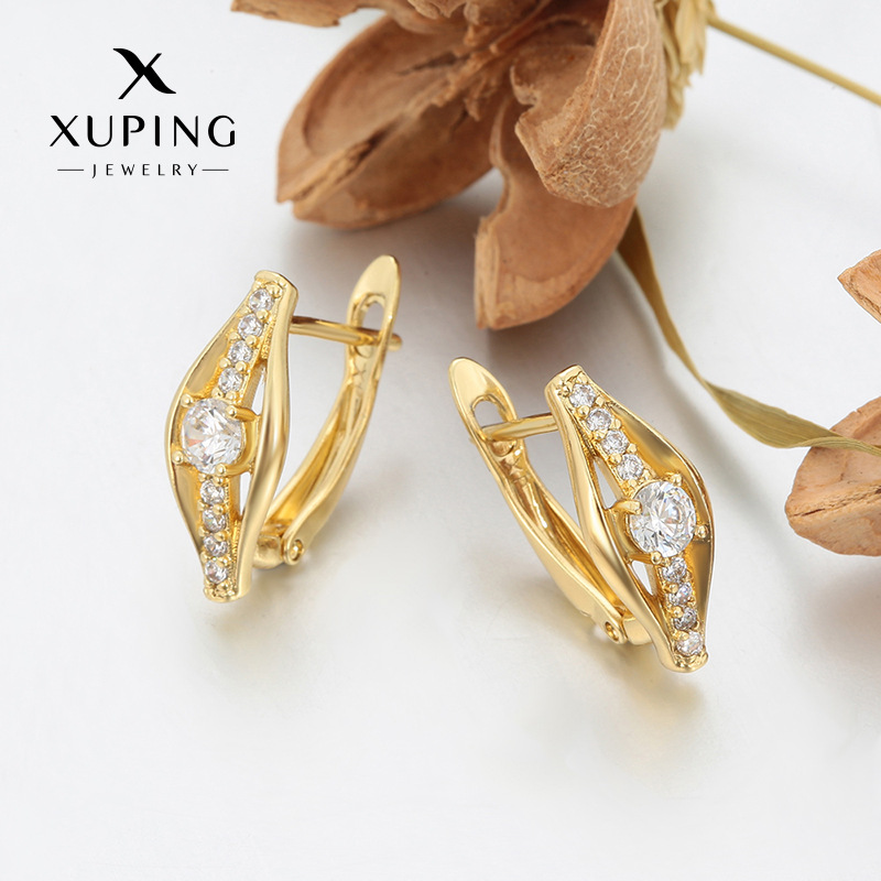 Xuping incrustado una sola fila de gemas artificiales europeas y estadounidenses transfronterizas moda fría viento personalidad auriculares al por mayor mujeres