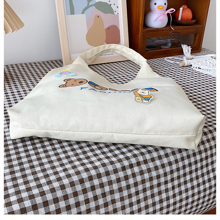 2021 Summer Japanese-style simple canvas bag, student backpack, single-shoulder handbag for going out, cartoon badge cotton bag undefined