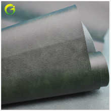现货供应 油皮疯马热压变色PU皮革 0.7压变革 皮套封面商标皮具用
