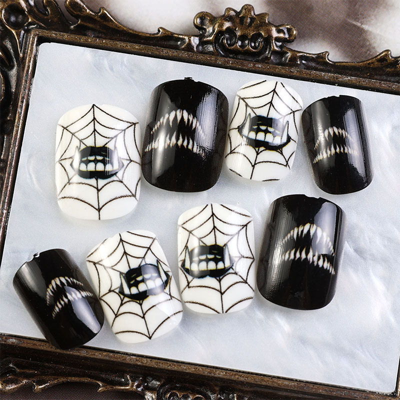 Uña de vestir Halloween serie negra francesa parche de uñas llama araña uña telaraña al por mayor