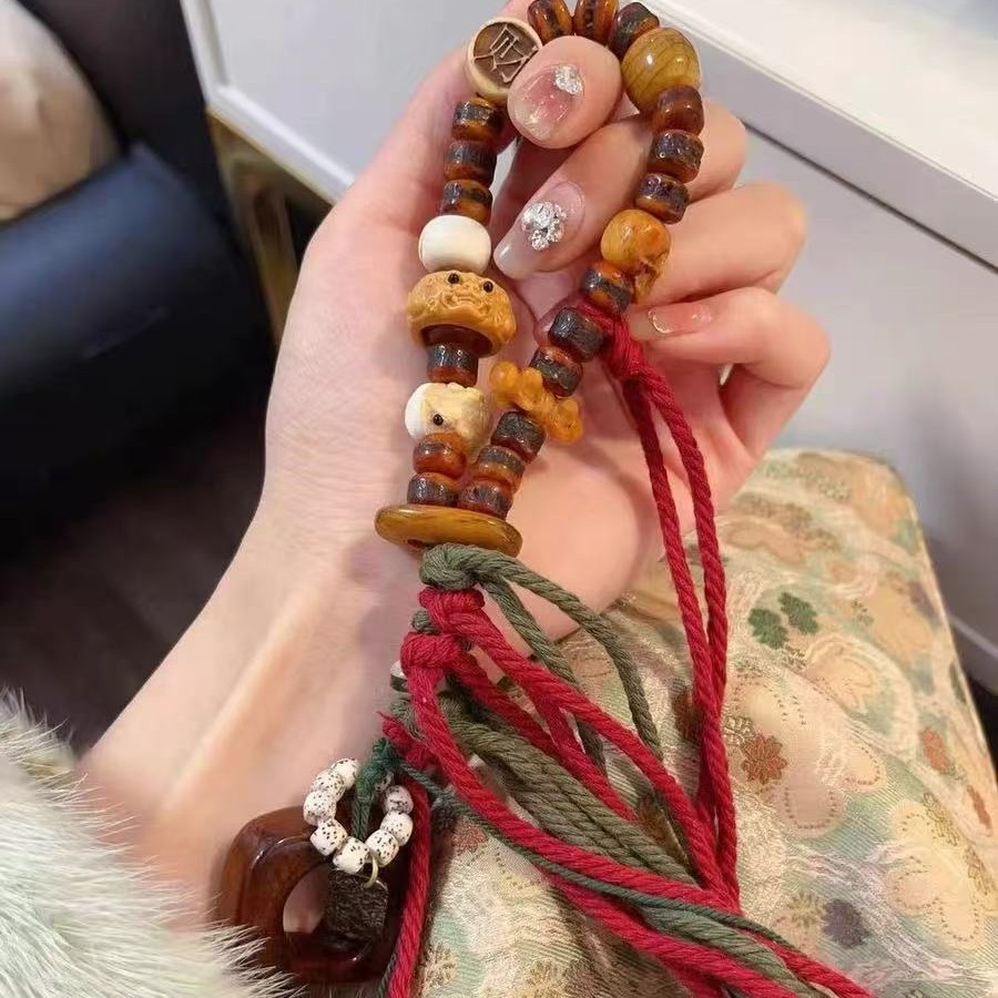 藏式驼骨手持搭配星月根付呱呱回流平安扣坨骨发财牌回流二饼手串