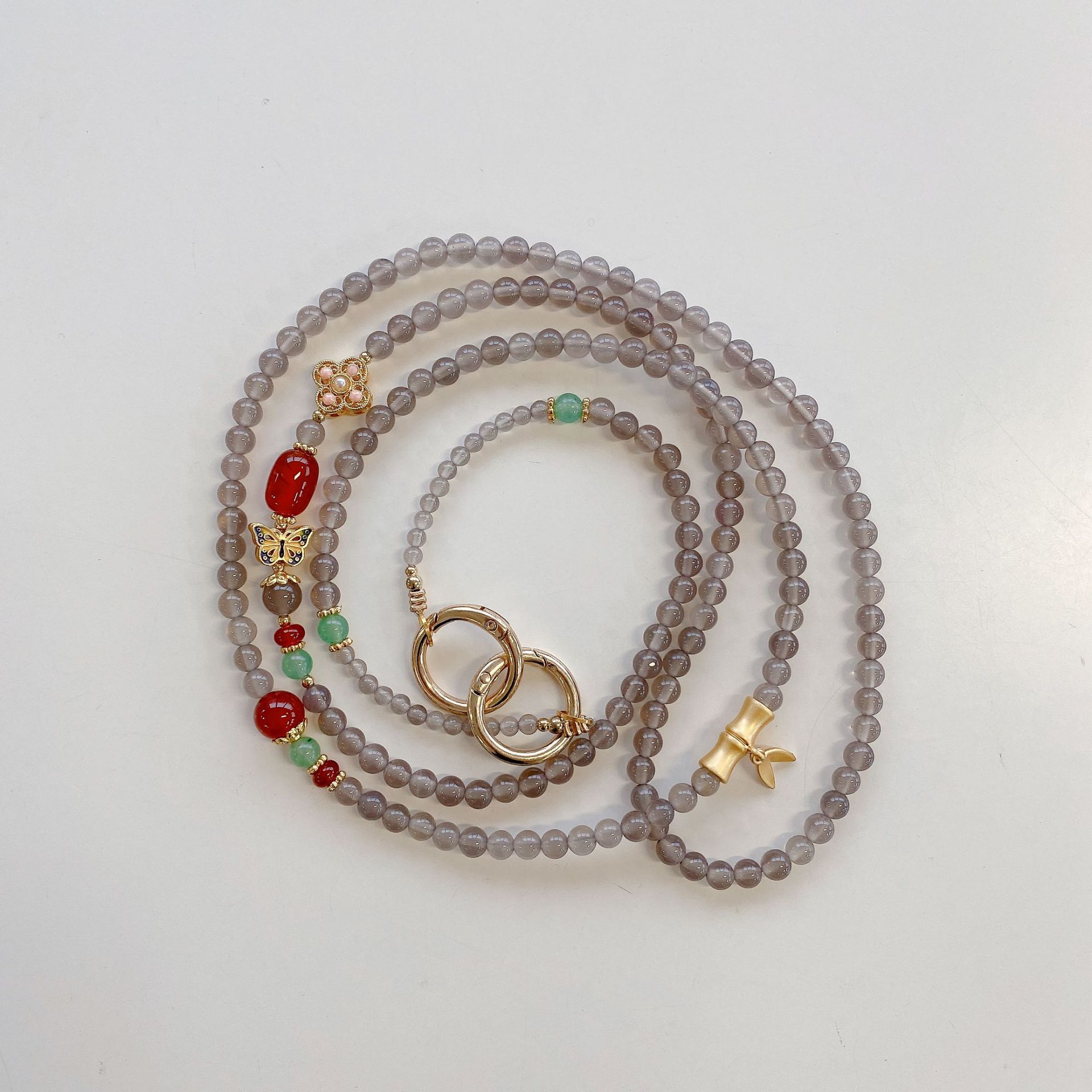 Boutique hecho a mano de alta gama para teléfono móvil cadena larga de ágata cloisonné femenina cordón de teléfono móvil de moda colgante de mensajero largo