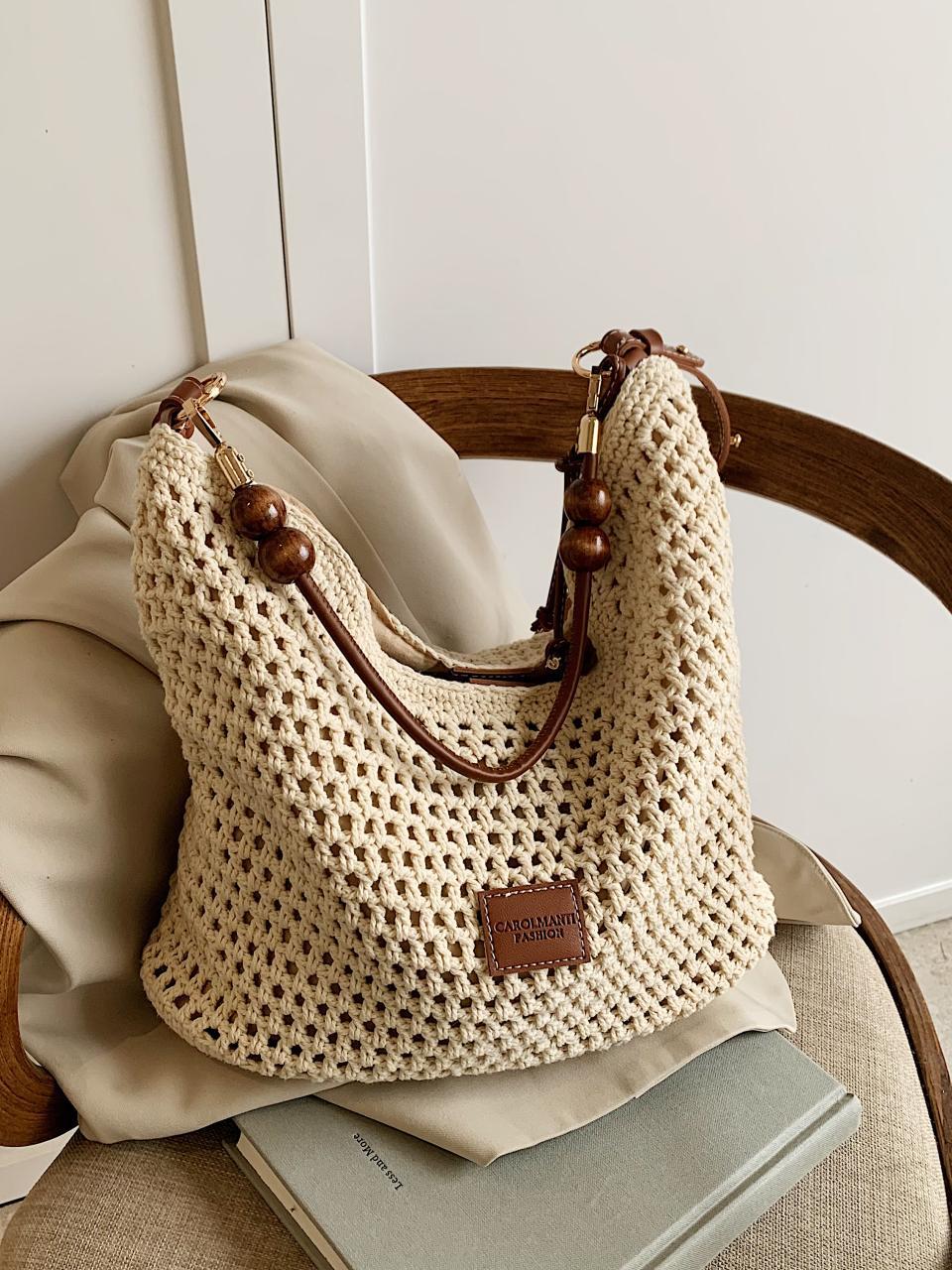Bolso tejido hueco, verano femenino, nuevo estilo, bolso tejido de paja, bolso de mensajero de un solo hombro de gran capacidad, bolso de playa de vacaciones junto al mar