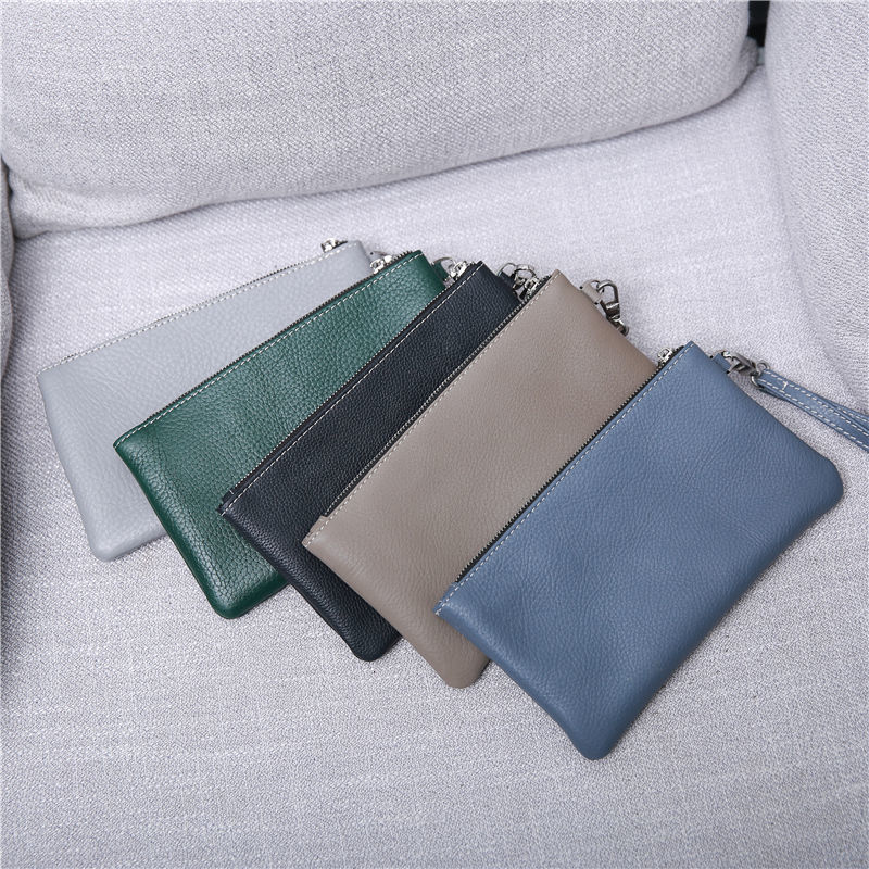 The first layer cowhide Baotou have more cash than can be accounted for wallet clutch bag 2021 new pattern capacity coin purse Grab bag