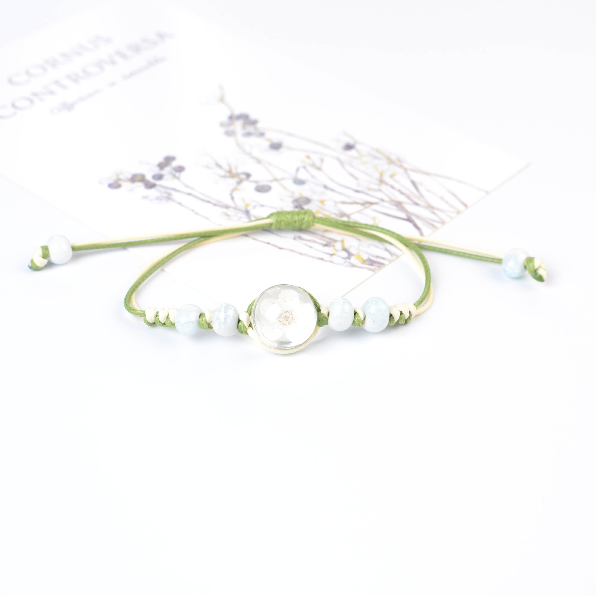 Woven white bracelet handmade, glass sample