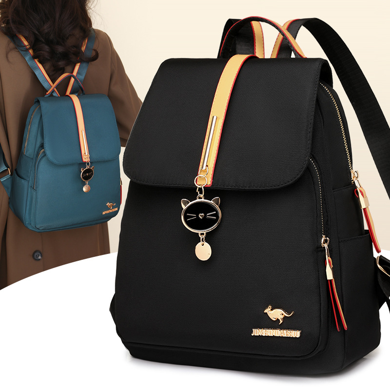 Mochila de nailon simple para mujer 2024 nueva mochila para mujer de viaje de mediana edad, moda de todo fósforo, mochila de gran capacidad, marea