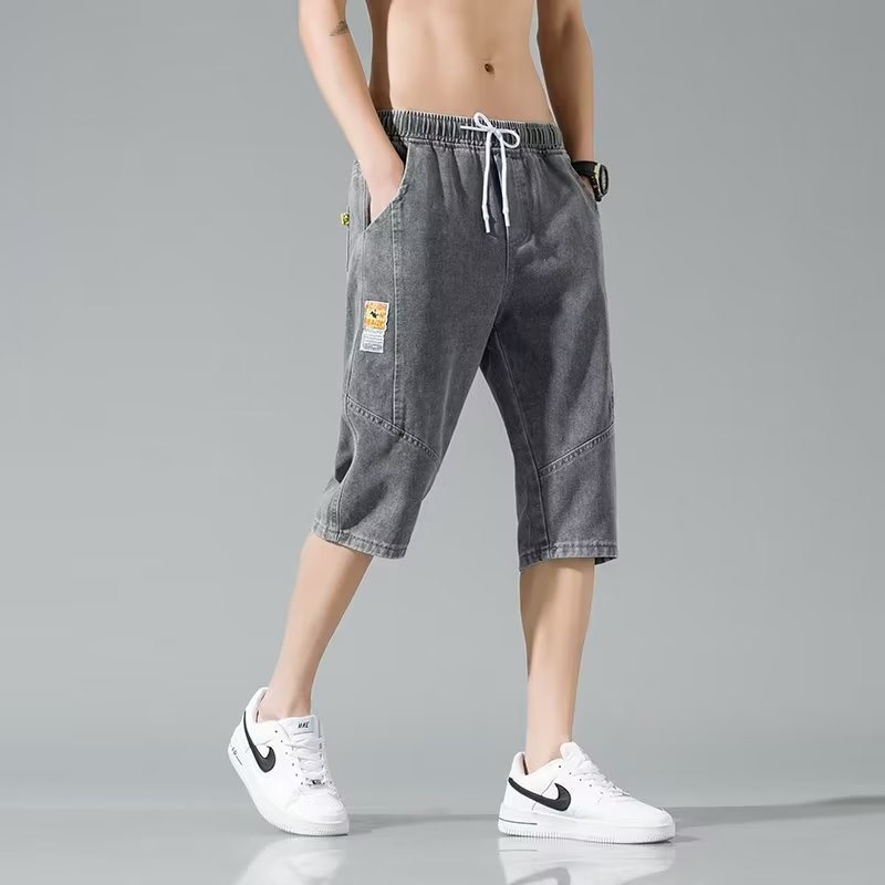 Moda verano mezclilla tendencia de los hombres sueltos rectos tallas grandes pantalones recortados marca de moda de los hombres pantalones medios de 7 puntos estilo fino de verano