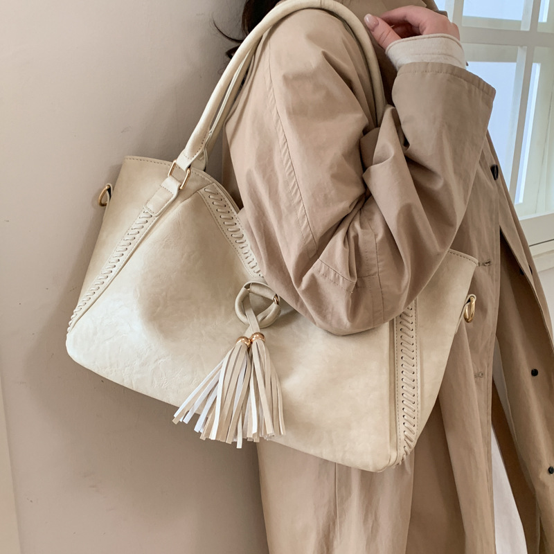 Bolsas de mujer transfronterizas de alto nivel, bolsas de borda de mano antiguas, bolsas de viaje cosidas a mano, bolsas de hombro casuales, bolsas axilales