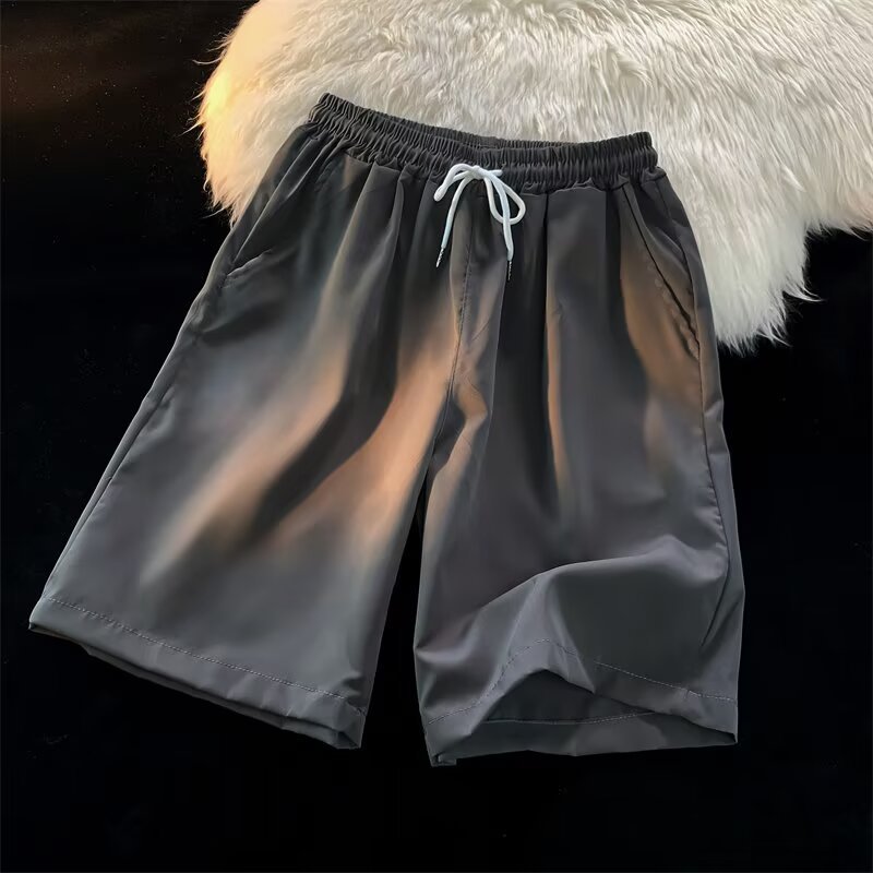 Personalizado al por mayor caramelo de viento neutro multicolor 25 colores primavera y verano nuevos pantalones cortos casuales de cinco puntos sueltos y cómodos