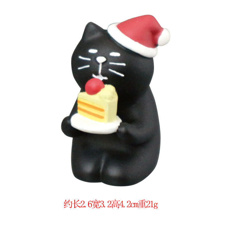 검은 고양이 먹는 케이크