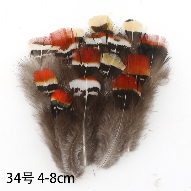 Fábrica al por mayor de bricolaje plumas pequeñas plumas naturales plumas de pollo salvaje plumas de pato jardín de infantes joyas hechas a mano gato divertido material de captura de sueños